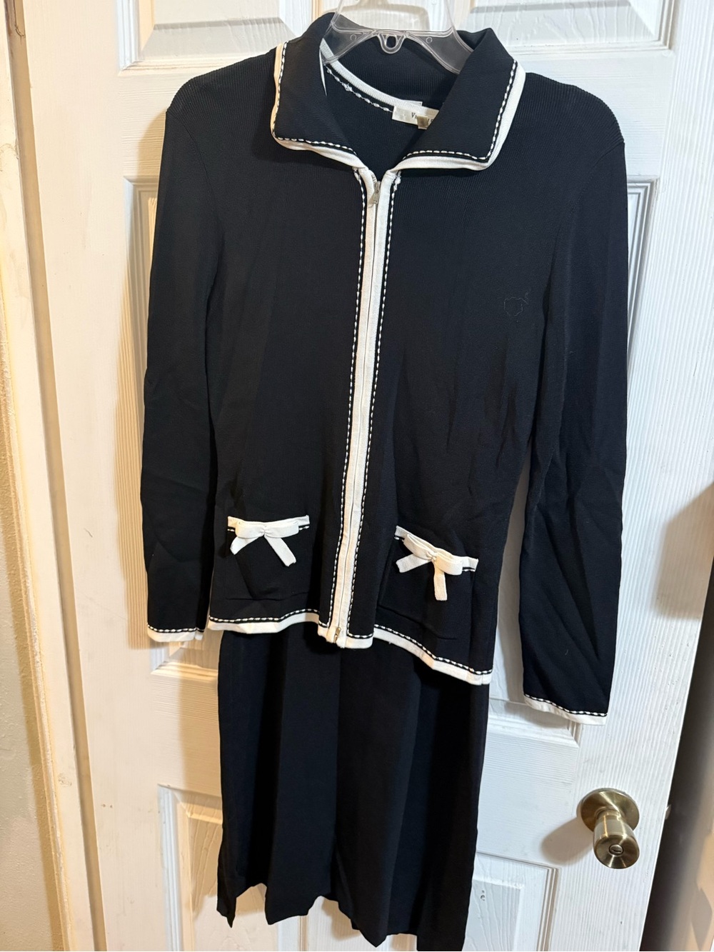 Vertigo Paris Black Knit Zip Jacket with White Trim and Pocket Bows